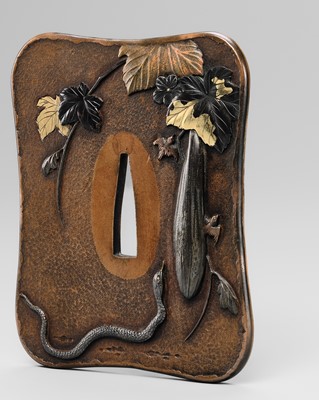 TOSHITSUGU: A SUPERB SUAKA TSUBA WITH A SNAKE AND LOOFAH GOURD, WITH NBTHK TOKUBETSU KICHO (ESPECIALLY PRECIOUS) CERTIFICATE