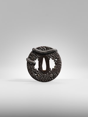 Lot 55 - IWAMOTO RYOKAN: A FINE IWAMOTO SCHOOL IRON TSUBA OF A SNAKE ON A TRUNK