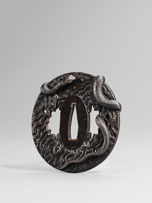 Lot 55 - IWAMOTO RYOKAN: A FINE IWAMOTO SCHOOL IRON TSUBA OF A SNAKE ON A TRUNK