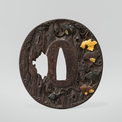 AN IRON HAMANO SCHOOL TSUBA DEPICTING A SNAIL ON AN OLD TREE, WITH HOZON TOSOGU NBTHK CERTIFICATE