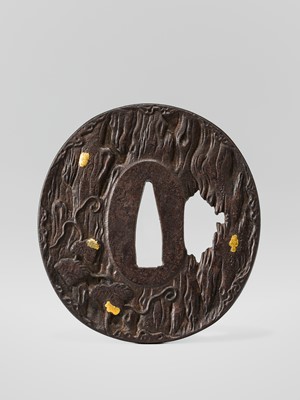 AN IRON HAMANO SCHOOL TSUBA DEPICTING A SNAIL ON AN OLD TREE, WITH HOZON TOSOGU NBTHK CERTIFICATE