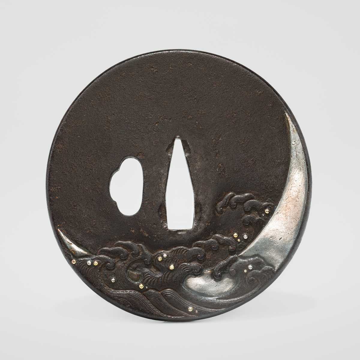 Lot 58 - A SHOAMI SCHOOL IRON TSUBA WITH WAVES AND A CRESCENT MOON, WITH NBTHK TOKUBETSU KICHO (ESPECIALLY PRECIOUS) CERTIFICATE