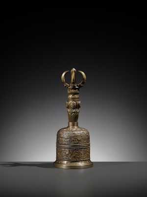 AN UNUSUAL AND LARGE PARCEL-GILT BRONZE FOUR-PRONGED VAJRA BELL
