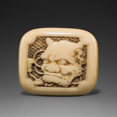 KAKUYUSAI HIRONOBU: A FINE WALRUS TUSK MANJU NETSUKE OF AN ONI MASK