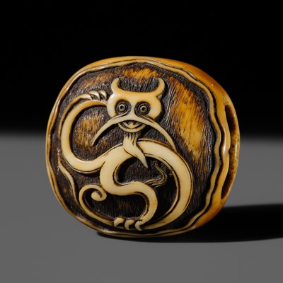 Lot 333 - A VERY FINE WALRUS TUSK ‘OBIDOME’ NETSUKE OF A RAIN DRAGON