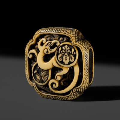 Lot 334 - A FINE IVORY ‘OBIDOME’ NETSUKE OF A RAIN DRAGON AND MON, ATTRIBUTED TO KOKUSAI
