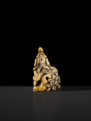 Lot 100 - A POWERFUL AND LARGE IVORY NETSUKE OF A BAKU