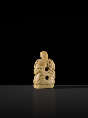 Lot 76 - A LARGE AND UNUSUAL SOLID WALRUS TUSK NETSUKE OF GAMA SENNIN