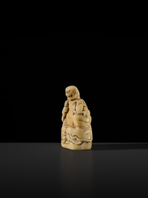 Lot 76 - A LARGE AND UNUSUAL SOLID WALRUS TUSK NETSUKE OF GAMA SENNIN