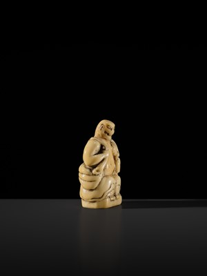 Lot 76 - A LARGE AND UNUSUAL SOLID WALRUS TUSK NETSUKE OF GAMA SENNIN