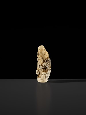 Lot 112 - A RARE KYOTO SCHOOL MARINE TOOTH NETSUKE OF A DRAGON AND TIGER