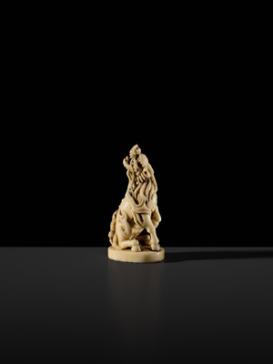 Lot 98 - A SUPERB IVORY SEAL-TYPE (INGYO) NETSUKE OF A KIRIN