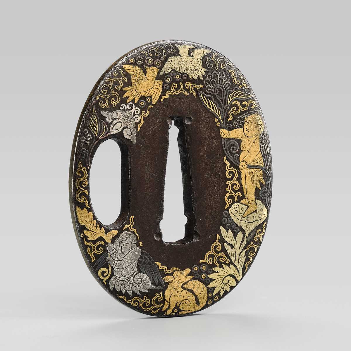 A VERY RARE ‘EUROPEAN LEATHER’ AWA SCHOOL IRON TSUBA