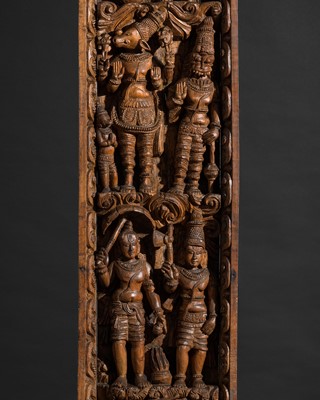 Lot 631 - A LARGE CARVED WOOD DOOR PANEL DEPICTING THE TEN PRINCIPAL INCARNATIONS OF VISHNU, DASHAVATARA