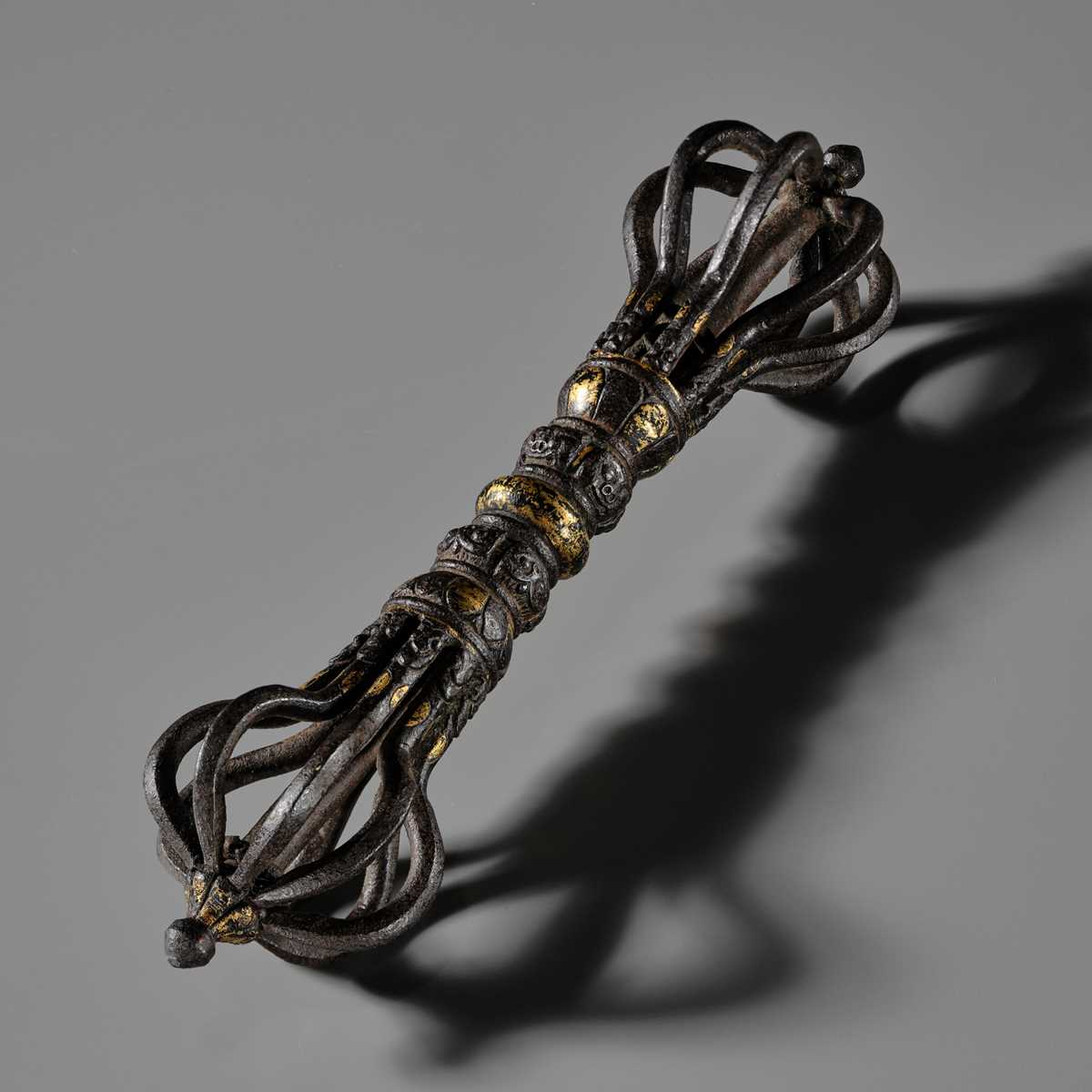 Lot 1 - A LARGE PARCEL-GILT IRON VAJRA, TIBET, 12TH-13TH CENTURY