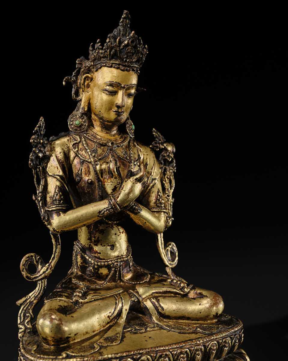 Lot 15 - A GILT COPPER-ALLOY FIGURE OF VAJRADHARA, TIBET, CIRCA 15TH CENTURY