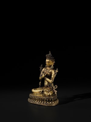 Lot 15 - A GILT COPPER-ALLOY FIGURE OF VAJRADHARA, TIBET, CIRCA 15TH CENTURY
