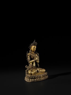 Lot 15 - A GILT COPPER-ALLOY FIGURE OF VAJRADHARA, TIBET, CIRCA 15TH CENTURY