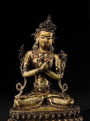 Lot 15 - A GILT COPPER-ALLOY FIGURE OF VAJRADHARA, TIBET, CIRCA 15TH CENTURY