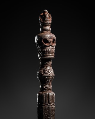 Lot 277 - A RARE IRON ‘SKULL’ RITUAL MACE, KAPALA DANDA, TIBET, 15TH-16TH CENTURY