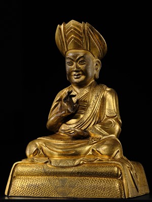 Lot 26 - A GILT COPPER ALLOY FIGURE OF ROLPAI DORJE, THE THIRD CHANGKYA HUTUKTU, QIANLONG PERIOD