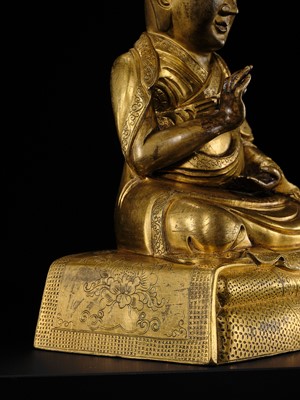 Lot 26 - A GILT COPPER ALLOY FIGURE OF ROLPAI DORJE, THE THIRD CHANGKYA HUTUKTU, QIANLONG PERIOD