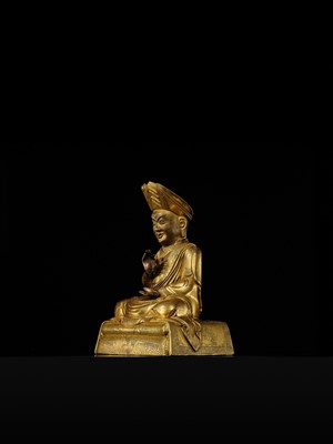 Lot 26 - A GILT COPPER ALLOY FIGURE OF ROLPAI DORJE, THE THIRD CHANGKYA HUTUKTU, QIANLONG PERIOD