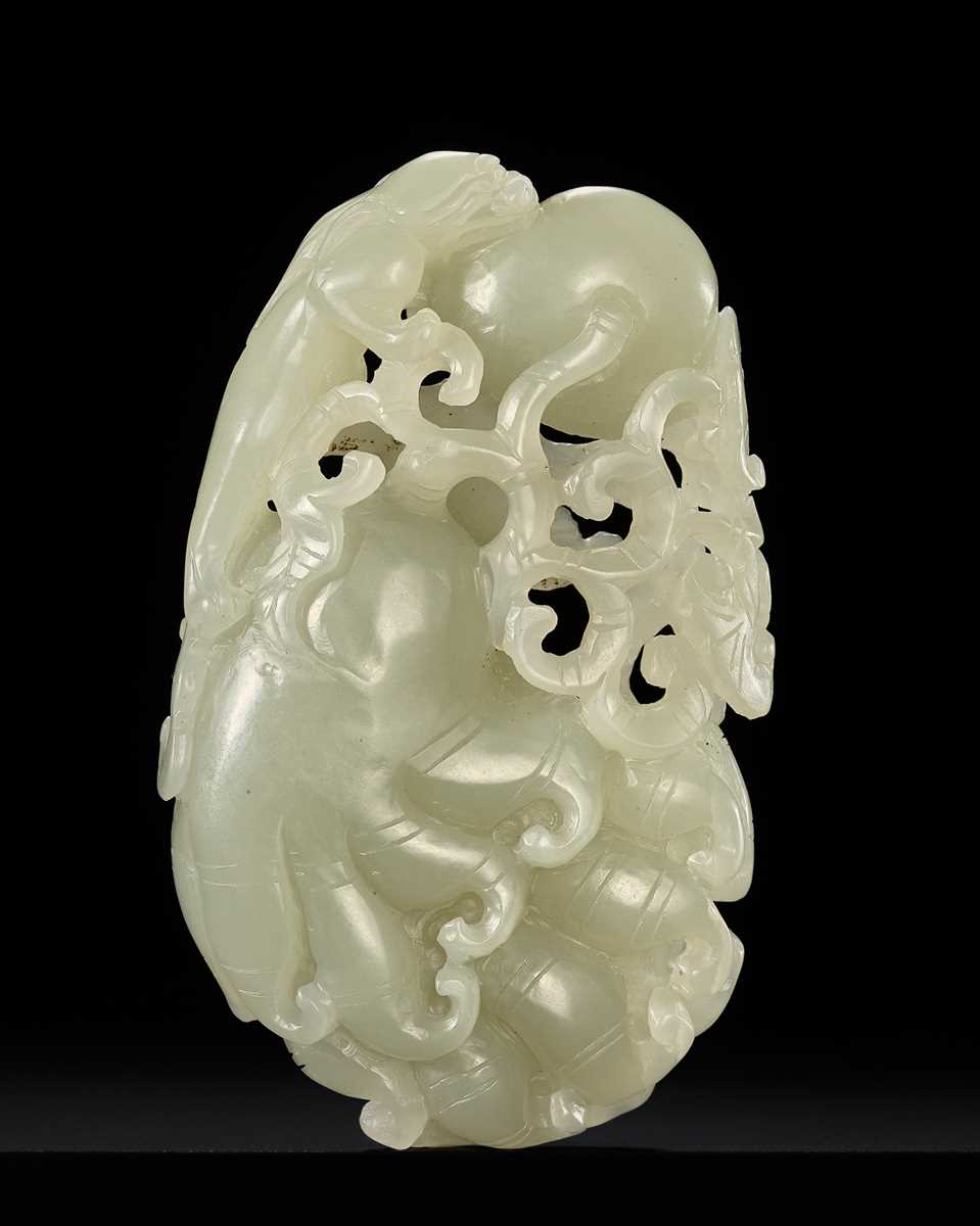 A RETICULATED ‘CHILONG AND FINGER CITRON’ CELADON JADE PENDANT, QING DYNASTY
