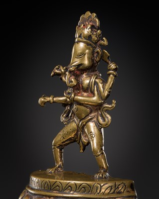 Lot 320 - A SMALL BRONZE FIGURE OF A DANCING GANESHA, NEPAL, 18TH-19TH CENTURY