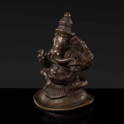 Lot 625 - A COPPER ALLOY FIGURE OF GANESHA, SOUTH INDIA,17TH-18TH CENTURY