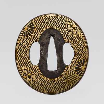 Lot 558 - A FINE TANTO TSUBA WITH AJIRO PATTERN