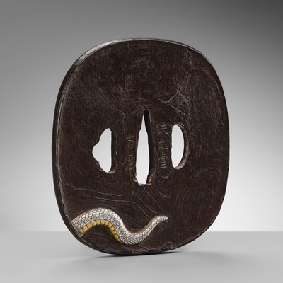 Lot 57 - A SUPERB AND LARGE BAKUMATSU IRON TSUBA WITH A GOLD EAGLE AND SILVER SNAKE