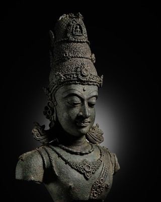 Lot 237 - A LARGE AND IMPORTANT BRONZE BUST OF AVALOKITESHVARA, SRIVIJAYA, 8TH-10TH CENTURY