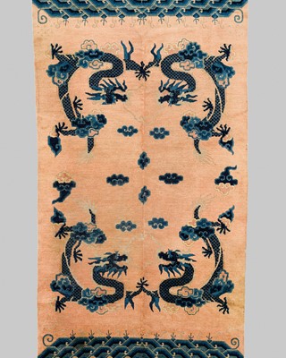 Lot 555 - A NINGXIA ‘DRAGON’ WOOL CARPET, LATE QING DYNASTY