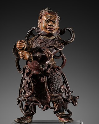Lot 101 - A RARE LACQUERED BRONZE FIGURE OF VAISHRAVANA, YUNNAN, 13TH-14TH CENTURY