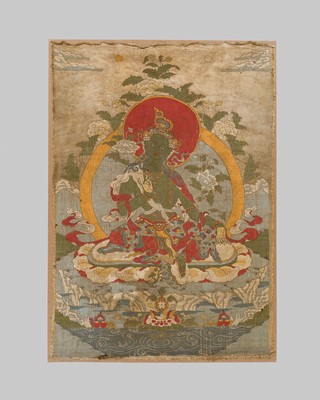 Lot 43 - A SILK EMBROIDERED THANGKA OF GREEN TARA, 18TH-19TH CENTURY