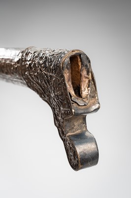 Lot 1380 - A HORN AND SILVER-ALLOY REPOUSSÉ DAGGER (GOLOK OR PEDANG), 19TH CENTURY