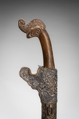 Lot 1380 - A HORN AND SILVER-ALLOY REPOUSSÉ DAGGER (GOLOK OR PEDANG), 19TH CENTURY