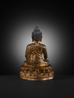 Lot 60 - A GILT-LACQUERED BRONZE FIGURE OF THE MEDICINE BUDDHA, BHAISHAJYAGURU, MING DYNASTY