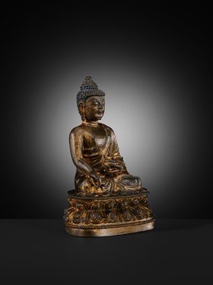 Lot 60 - A GILT-LACQUERED BRONZE FIGURE OF THE MEDICINE BUDDHA, BHAISHAJYAGURU, MING DYNASTY
