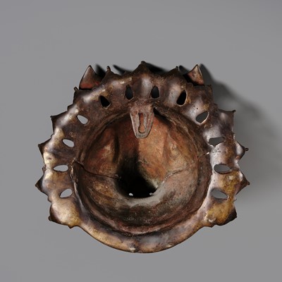Lot 315 - A BRONZE BHUTA MASK IN THE FORM OF A PANJURLI BHUTA (BOAR SPIRIT DEITY), TULU NADU, 18TH-19TH CENTURY