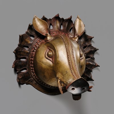 Lot 315 - A BRONZE BHUTA MASK IN THE FORM OF A PANJURLI BHUTA (BOAR SPIRIT DEITY), TULU NADU, 18TH-19TH CENTURY