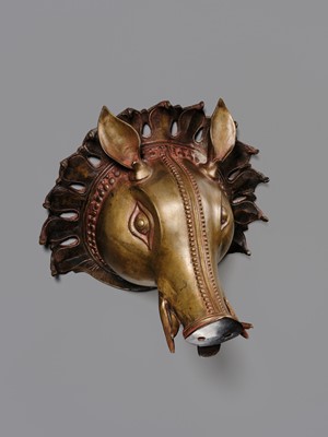 Lot 315 - A BRONZE BHUTA MASK IN THE FORM OF A PANJURLI BHUTA (BOAR SPIRIT DEITY), TULU NADU, 18TH-19TH CENTURY