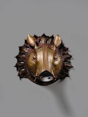 Lot 315 - A BRONZE BHUTA MASK IN THE FORM OF A PANJURLI BHUTA (BOAR SPIRIT DEITY), TULU NADU, 18TH-19TH CENTURY