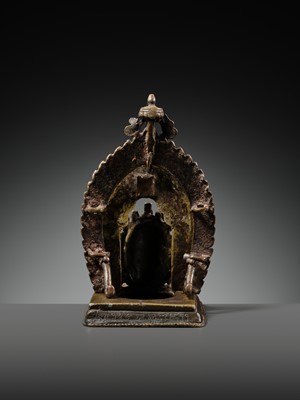 A GILT-BRONZE CAST AND REPOUSSÉ ISHTADEVATA SHRINE, NEPAL, DATED 1824