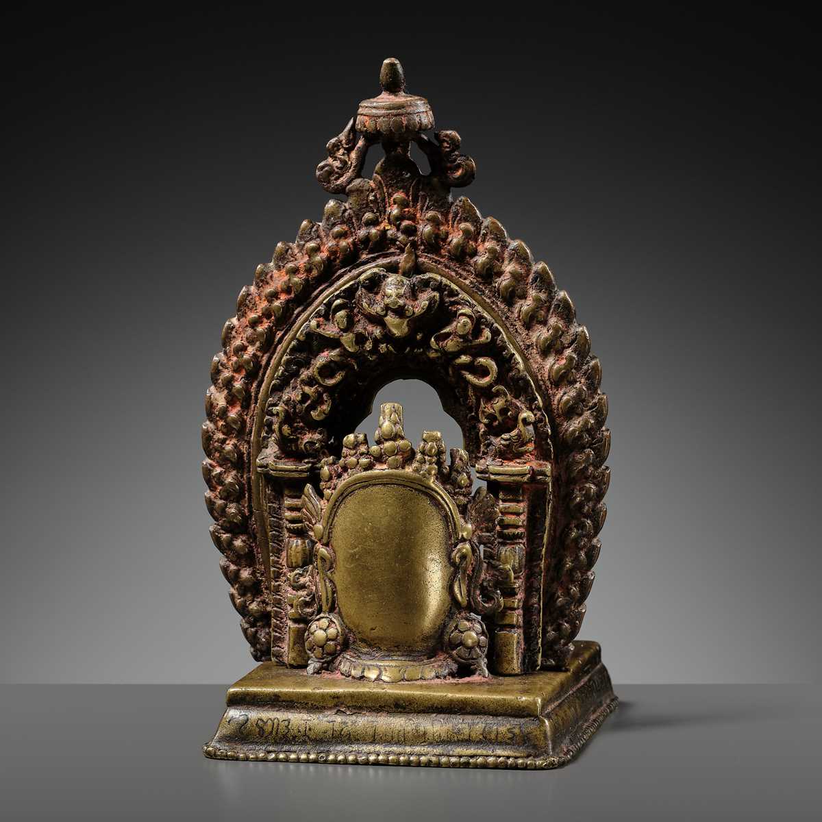 A GILT-BRONZE CAST AND REPOUSSÉ ISHTADEVATA SHRINE, NEPAL, DATED 1824