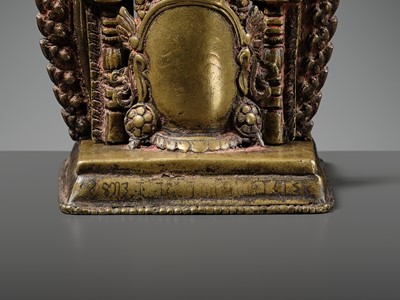 A GILT-BRONZE CAST AND REPOUSSÉ ISHTADEVATA SHRINE, NEPAL, DATED 1824