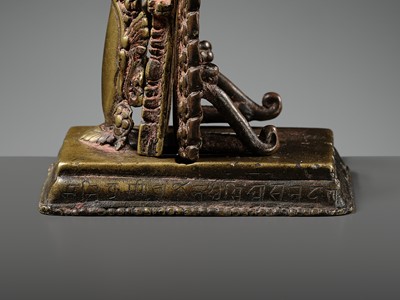 A GILT-BRONZE CAST AND REPOUSSÉ ISHTADEVATA SHRINE, NEPAL, DATED 1824