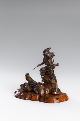 Lot 32 - A BRONZE OKIMONO OF A SAMURAI HUNTING A TIGER