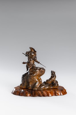Lot 32 - A BRONZE OKIMONO OF A SAMURAI HUNTING A TIGER
